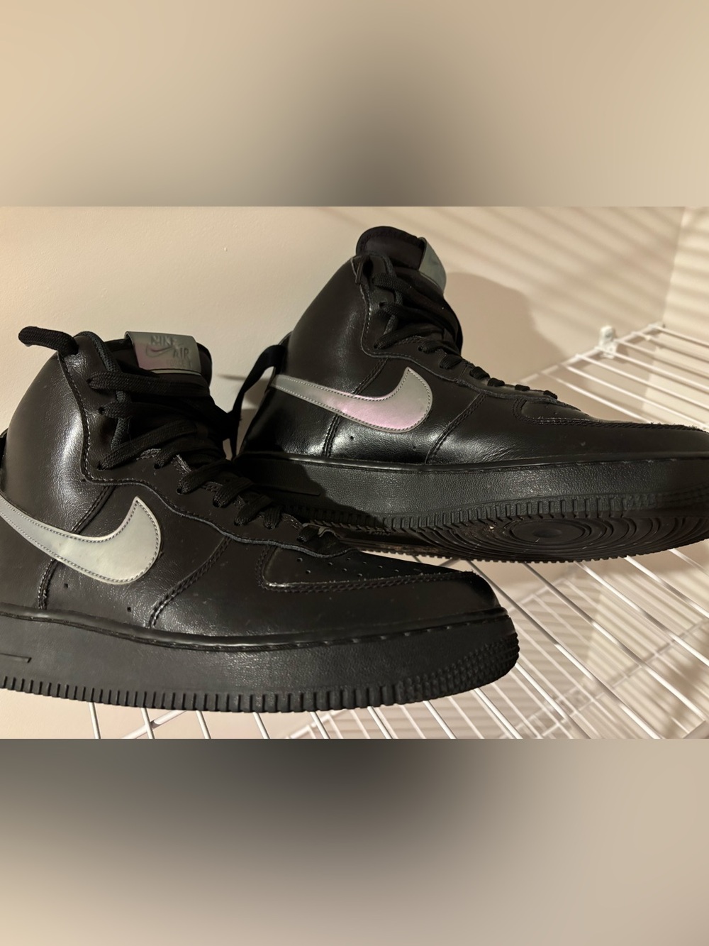 Nike Black High-Top Sneakers with Iridescent Swoosh
